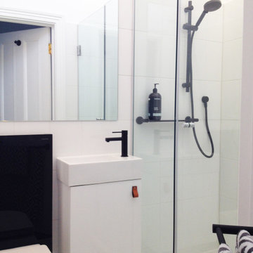 White tiny ensuite bathroom