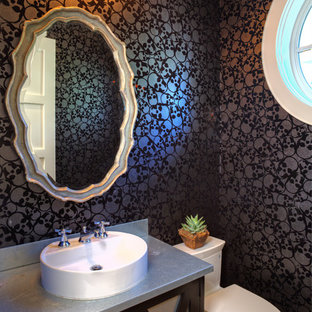 Design ideas for a small transitional bathroom in Orange County with a vessel sink, zinc benchtops, a one-piece toilet, furniture-like cabinets, dark wood cabinets, black walls and medium hardwood floors.