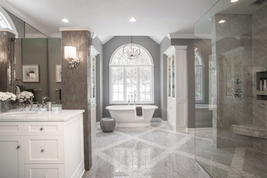 Example of a transitional master white tile marble floor bathroom design in St Louis with recessed-panel cabinets, quartz countertops and gray walls