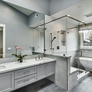 Bathroom - large farmhouse master white tile and porcelain tile limestone floor and gray floor bathroom idea in San Francisco with shaker cabinets, gray cabinets, a one-piece toilet, gray walls, an undermount sink, quartz countertops and a hinged shower door