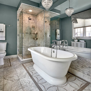 Inspiration for a mid-sized transitional master gray tile and stone tile mosaic tile floor and gray floor bathroom remodel in Chicago with a two-piece toilet, blue walls and a hinged shower door