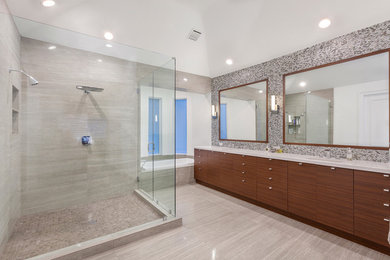 Inspiration for a huge contemporary master multicolored tile and ceramic tile porcelain tile and multicolored floor doorless shower remodel in Miami with flat-panel cabinets, medium tone wood cabinets, a one-piece toilet, multicolored walls, an undermount sink, quartzite countertops and a hinged shower door
