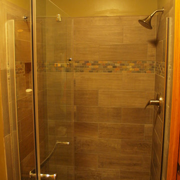 woodgrain tile shower with niche