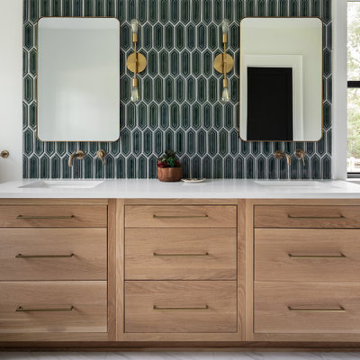 Example of a large cottage master green tile and glass tile marble floor, gray floor and double-sink bathroom design in New Orleans with a two-piece toilet, white walls, an undermount sink, quartz countertops, a hinged shower door and white countertops