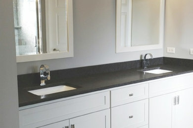 Bathroom - contemporary master bathroom idea in Chicago with shaker cabinets and granite countertops