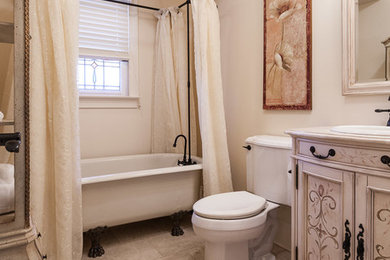 Example of a small classic beige tile and porcelain tile porcelain tile bathroom design in Los Angeles with a drop-in sink, marble countertops and a two-piece toilet