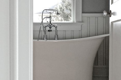 Inspiration for a coastal painted wood floor freestanding bathtub remodel in Richmond with gray walls