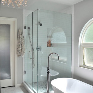 Large trendy master white tile and subway tile marble floor and beige floor bathroom photo in Denver with gray walls, an undermount sink and a hinged shower door