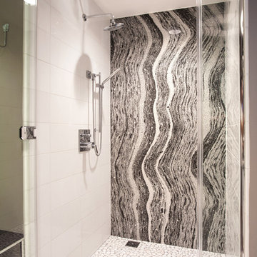 Zen like shower with granite countertop