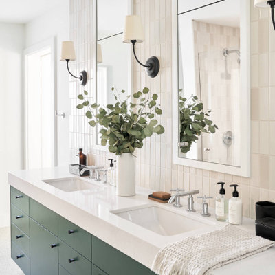 Bathroom - large mid-century modern master white tile terrazzo floor, white floor and double-sink bathroom idea in Austin with flat-panel cabinets, green cabinets, white walls, a drop-in sink, white countertops and a built-in vanity