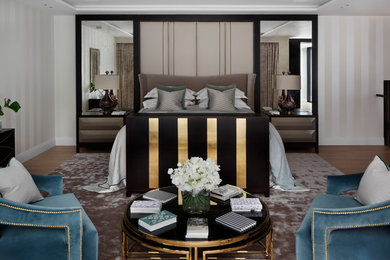 Imagen de dormitorio principal de estilo americano extra grande sin chimenea con paredes grises y moqueta