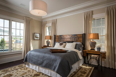 Example of a classic bedroom design in Atlanta with beige walls