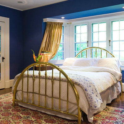 Elegant bedroom photo in Toronto with blue walls