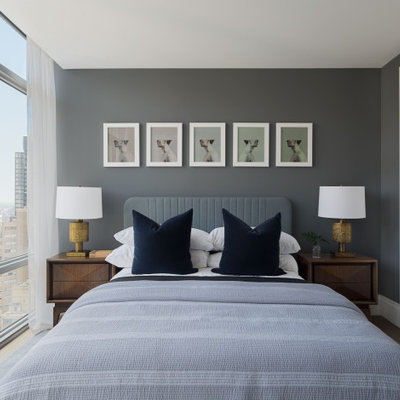 Bedroom - contemporary light wood floor bedroom idea in New York with gray walls and no fireplace