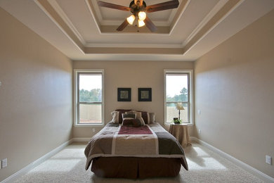 Example of a mid-sized classic master carpeted and gray floor bedroom design in Dallas with beige walls and no fireplace
