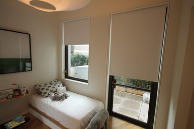 ニューヨークにあるコンテンポラリースタイルのおしゃれな寝室のインテリア
