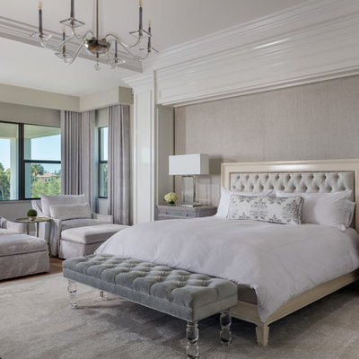 Bedroom - transitional master light wood floor bedroom idea in Other with beige walls and no fireplace