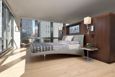 Example of a minimalist bedroom design in Chicago