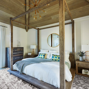Bedroom - tropical dark wood floor bedroom idea in Other with white walls