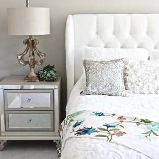 Medium sized vintage master bedroom in New York with white walls, carpet and white floors.