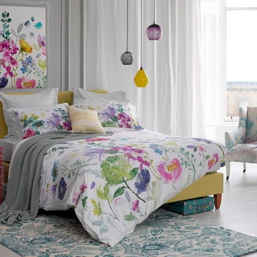 A grey bedroom with floral colour