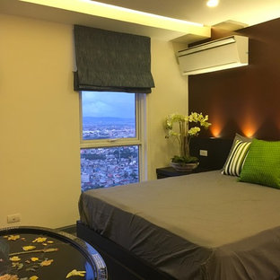 Imagen de dormitorio principal, actual, pequeño, sin chimenea, con paredes marrones, suelo de baldosas de porcelana y suelo gris