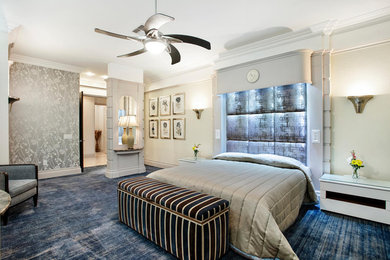 Imagen de dormitorio principal moderno con moqueta y suelo azul