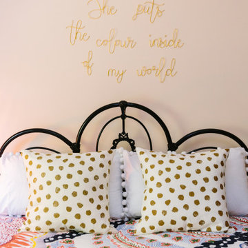 A young girl's bedroom with wire word art feature
