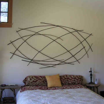 Above the bed stick artwork