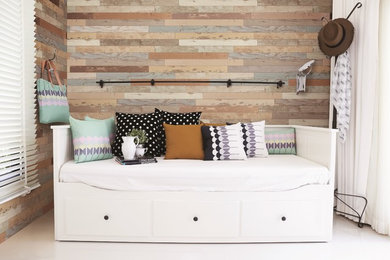Inspiration for an eclectic guest bedroom remodel in Denver with multicolored walls
