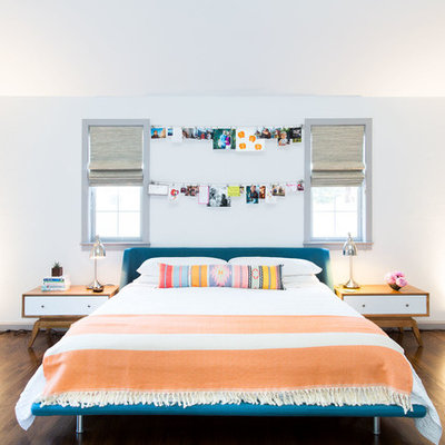 Inspiration for a mid-sized scandinavian master dark wood floor and brown floor bedroom remodel in San Francisco with white walls and no fireplace