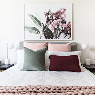 Small scandinavian bedroom in Sydney with white walls.