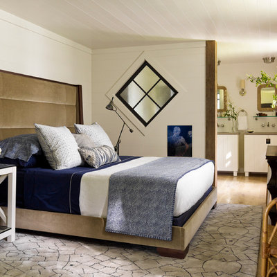 Example of a trendy bedroom design in New York with white walls