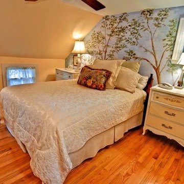 An attic bedroom in an stone cottage.