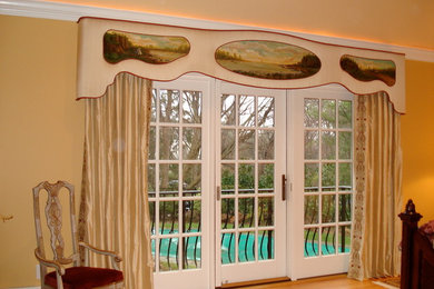 An elegant custom cornice board window treatment beautifully hand painted.