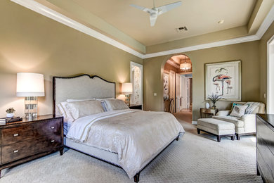 Large transitional master carpeted bedroom photo in Miami with beige walls and no fireplace