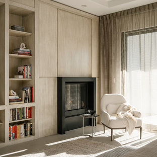 Example of a large trendy master porcelain tile and gray floor bedroom design in Los Angeles with white walls, a standard fireplace and a stone fireplace