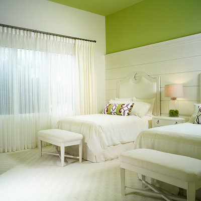 Bedroom - tropical guest carpeted bedroom idea in Miami with green walls