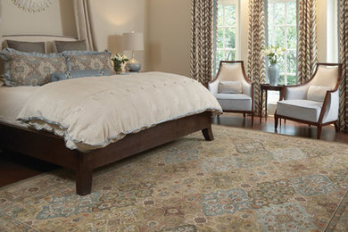 Example of a mid-sized classic master dark wood floor bedroom design in Seattle with beige walls and no fireplace
