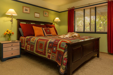 Example of a mid-sized classic guest carpeted bedroom design in San Francisco with green walls and no fireplace