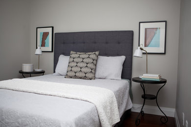 Inspiration for a small modern master bedroom remodel in Other with gray walls