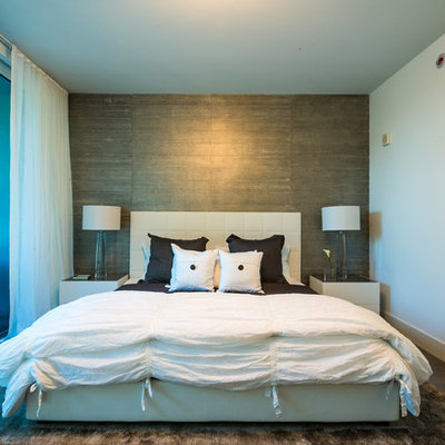 Bedroom - contemporary master porcelain tile bedroom idea in Miami with gray walls