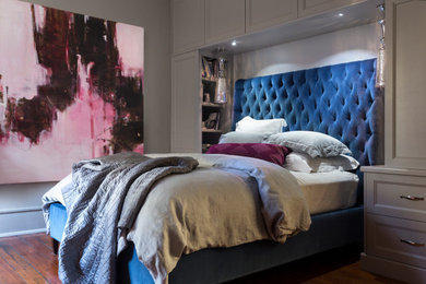 Bedroom - transitional dark wood floor and brown floor bedroom idea in Charleston with gray walls