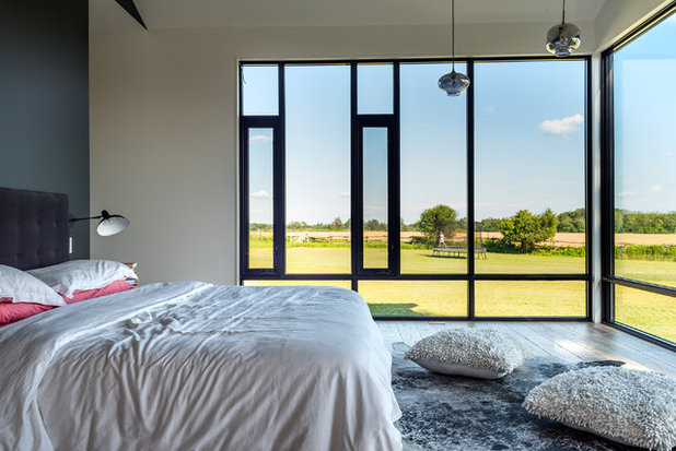 Country Bedroom by Roundabout Studio Inc.