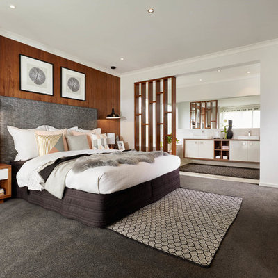 Trendy master carpeted bedroom photo in Melbourne
