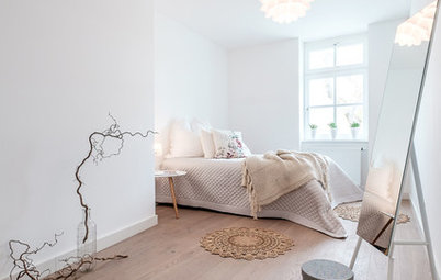 Fråga en designer: Hur arrangerar jag möblerna runt min matta?
