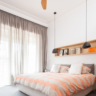 Inspiration for a mid-sized contemporary carpeted bedroom remodel in Melbourne with white walls and no fireplace