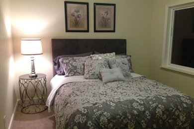 Small trendy guest carpeted bedroom photo in Seattle with beige walls