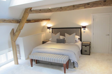 This is an example of a contemporary bedroom in Channel Islands.