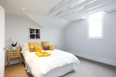 Design ideas for a contemporary bedroom in Surrey.